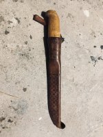 Here is one of my vintage knives. From sometime in the 80's(going by the  leather pattern) it's a J Marttiini Rapala knife from Finland. This was my  dads knife before he died